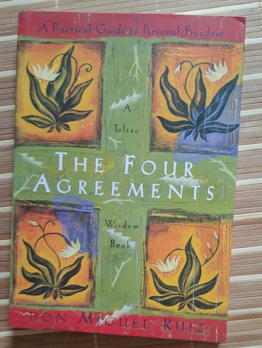 The Four Agreements by - Green / Orange Cover
